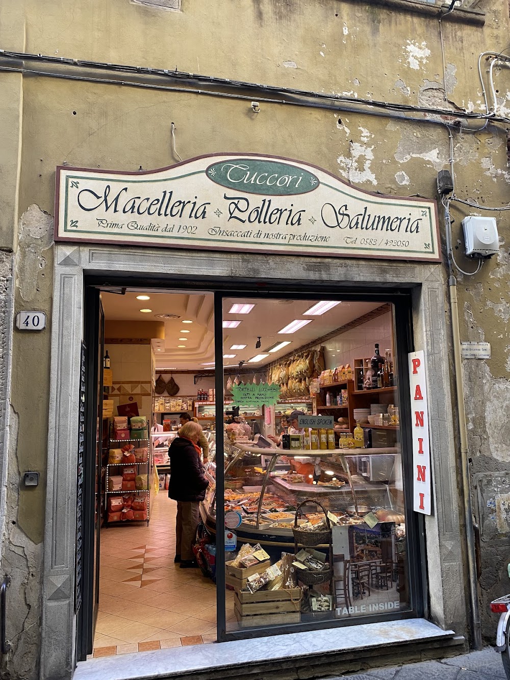 Macelleria Tuccori Mariano storefront sign in Lucca