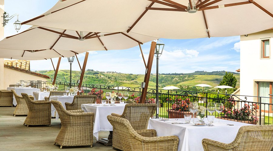 Empoli-area lunch table with Tuscan countryside in the background