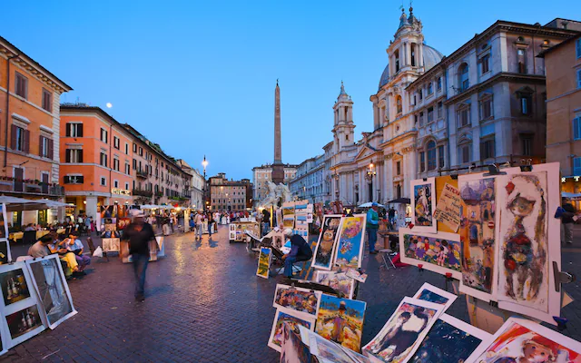 Shoppers walking along a fashion street in central Rome